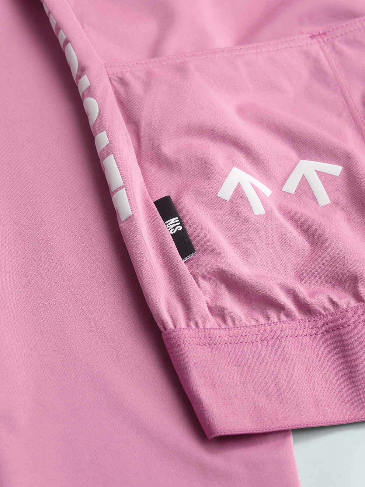 SYN Women's Pro Team APEX Club Jacket 2.0 - Blush - closeup - PRO_TEAM_APEX_CLUB_JACKET_M_BLUSH_DET2